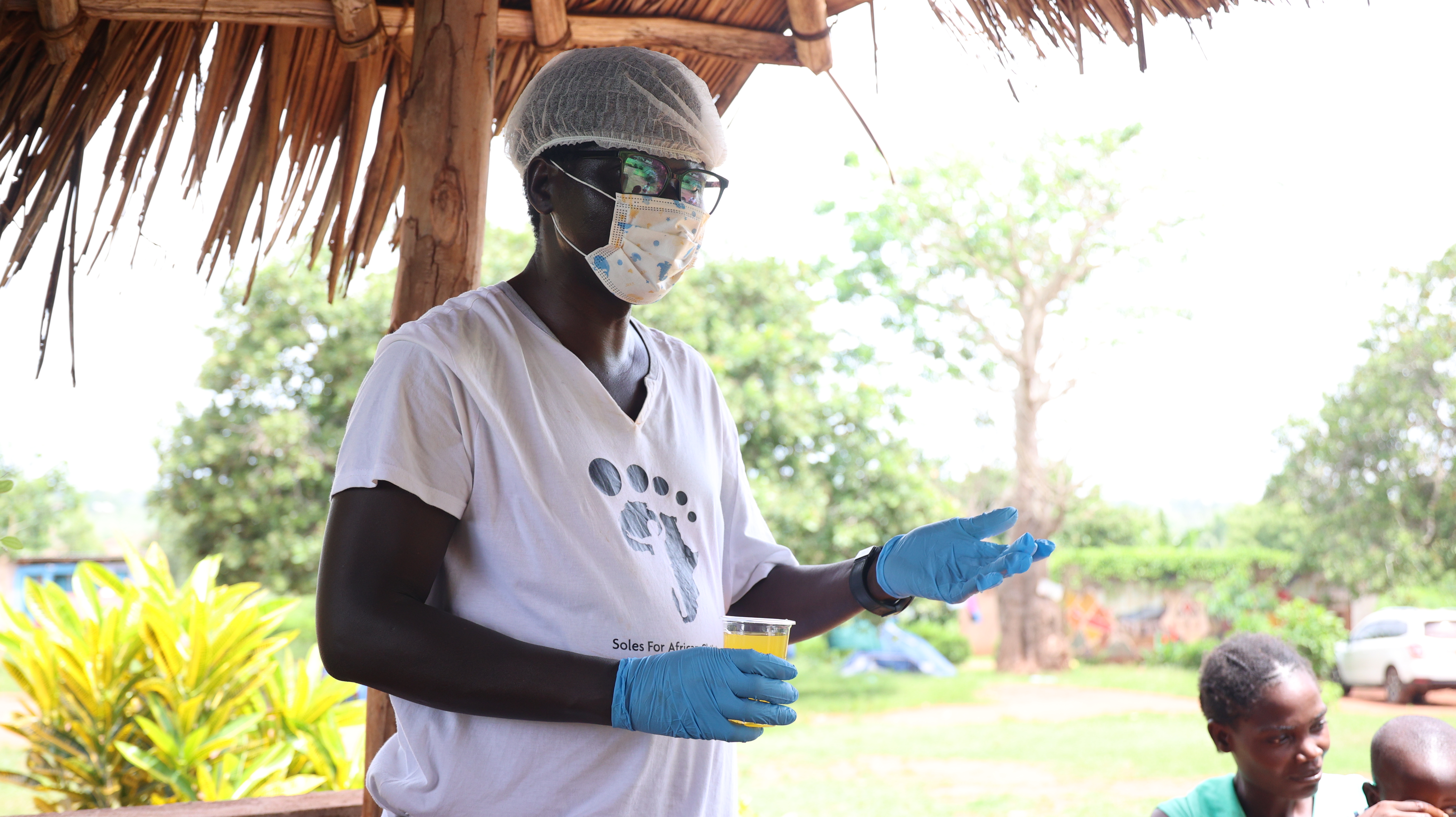 African black doctor medical practitioner helping patient