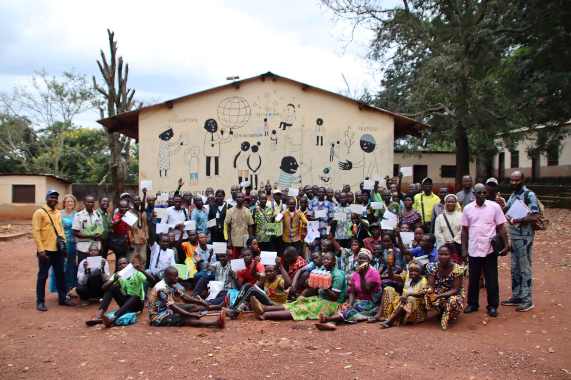 Young authentic black African group collaborating smiling